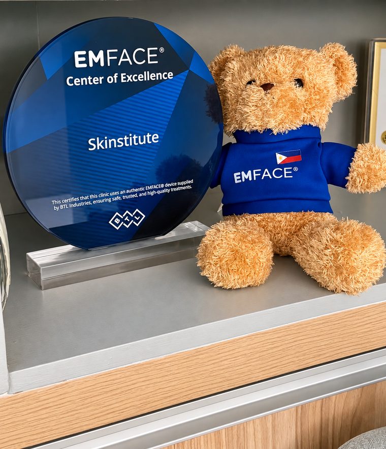 Skinstitute EmFace Center of Excellence recognition displayed beside the EmFace machine.
